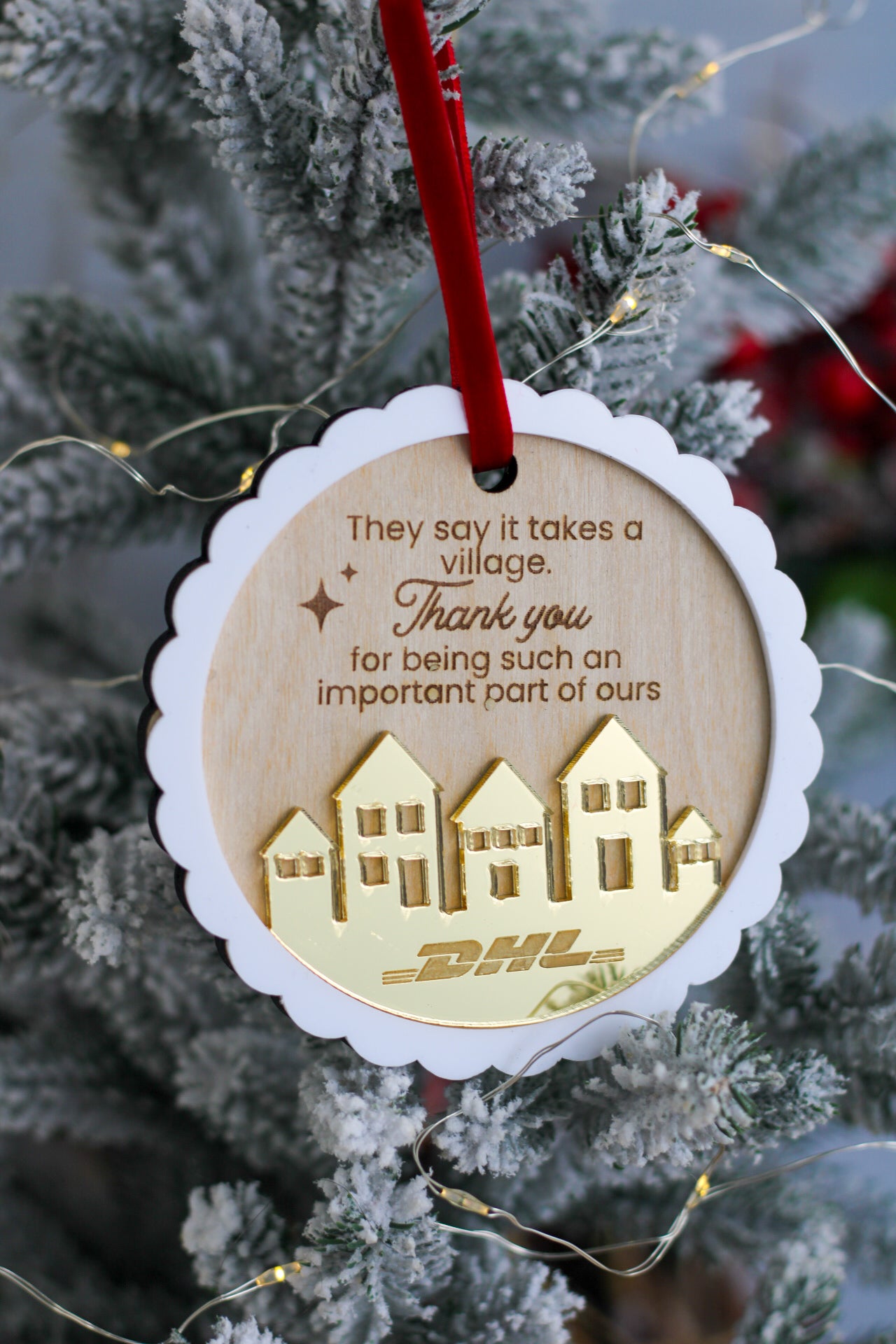 Ornamento It Takes a Village